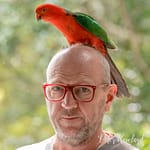 Peter Rowland and an Australian King Parrot