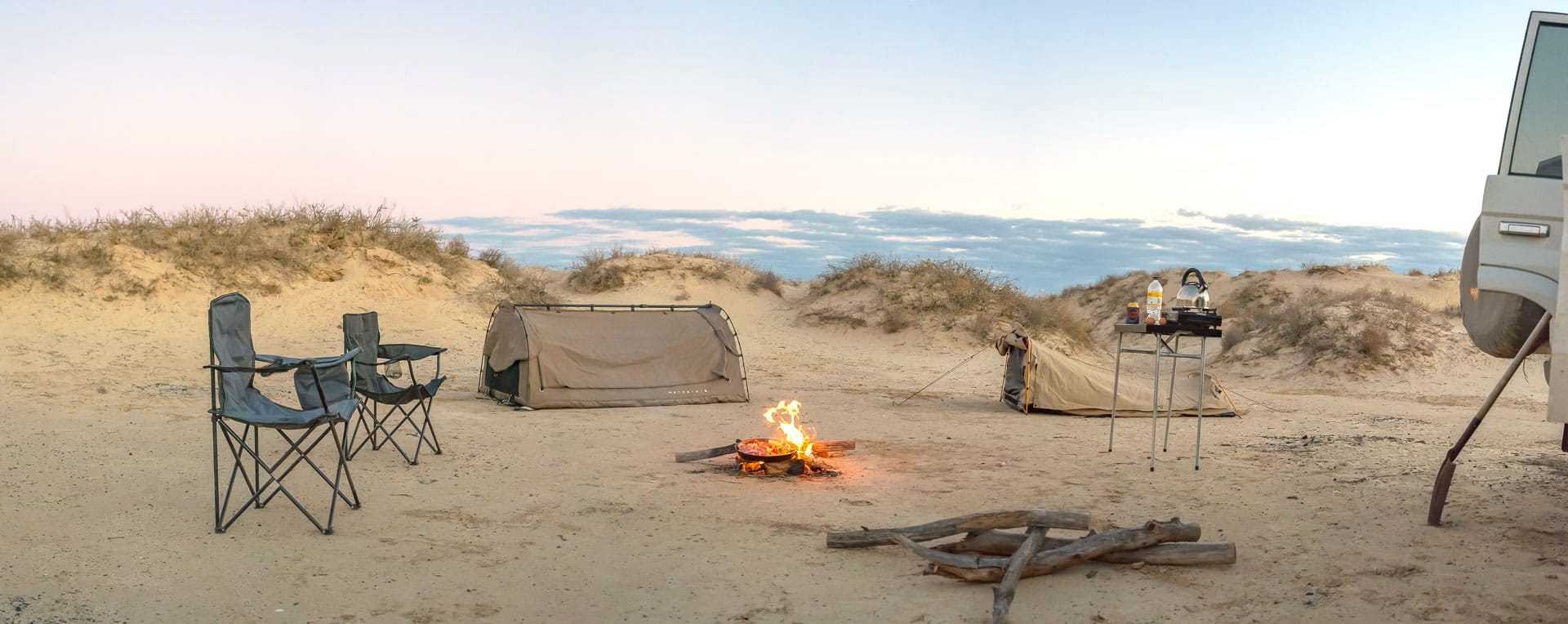 Swags around the campfire along the Strzelecki Track, SA